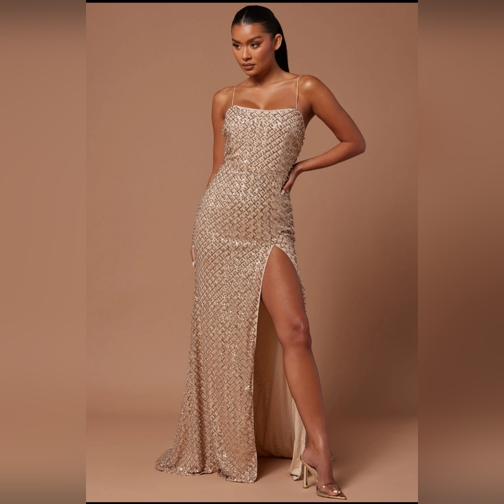 Beautiful Fashion Nova gown dress with slit.